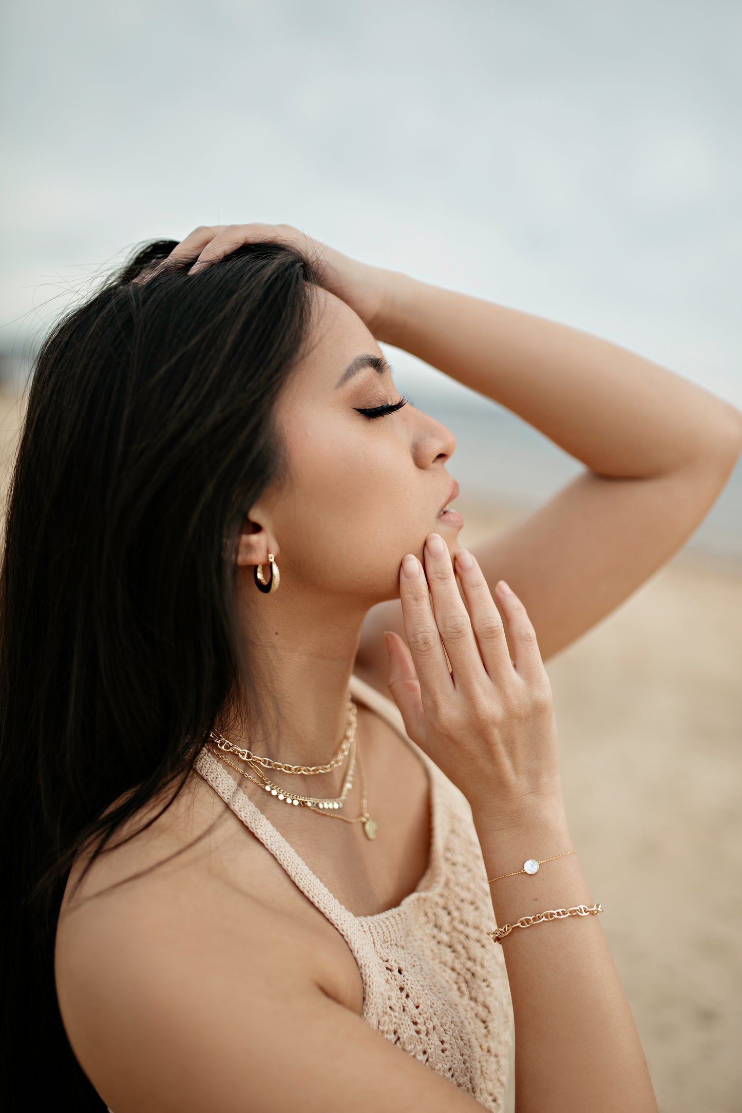 Woman wearing gold chain jewelry