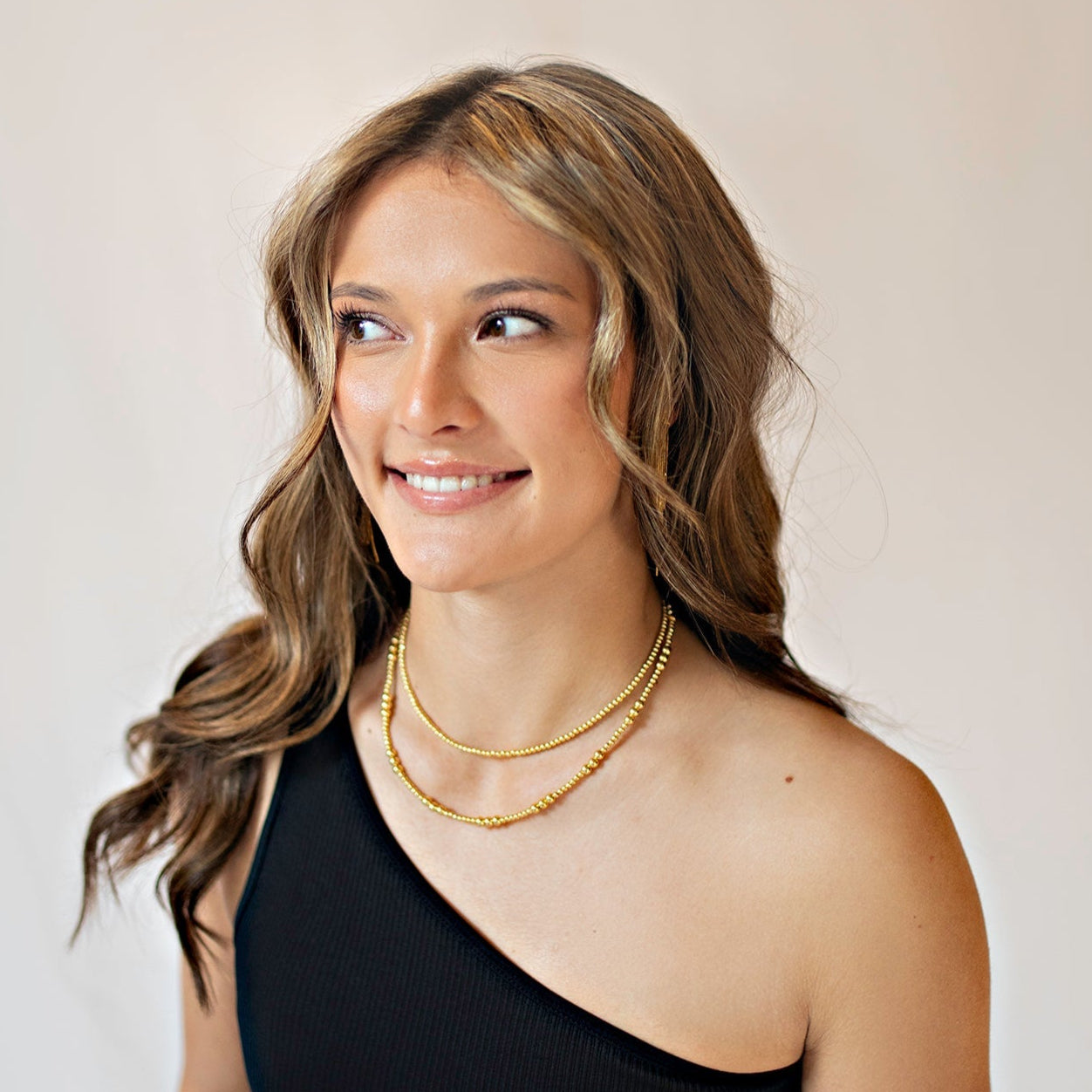 Gold Beaded necklace stack