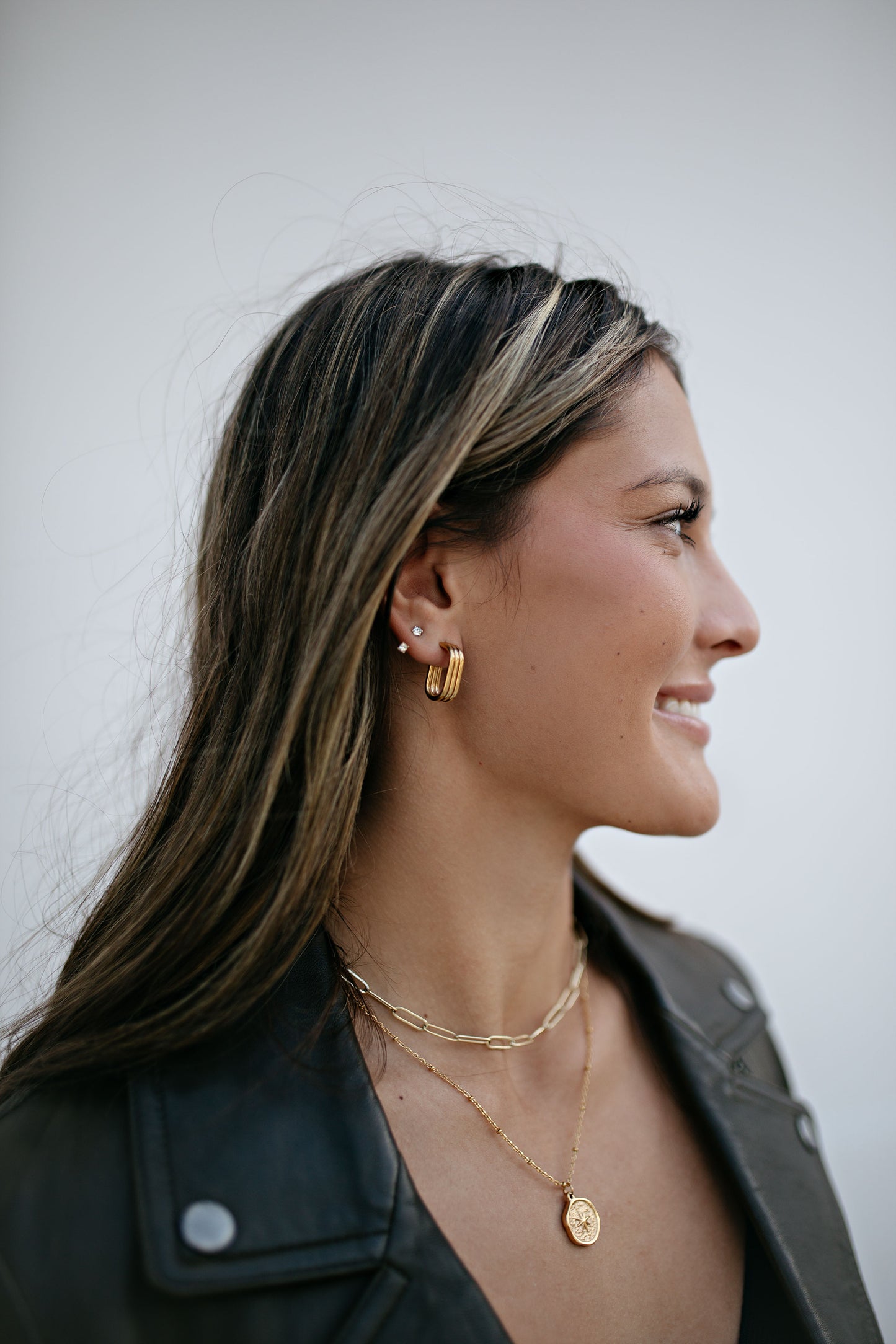 Gold oval textured earrings