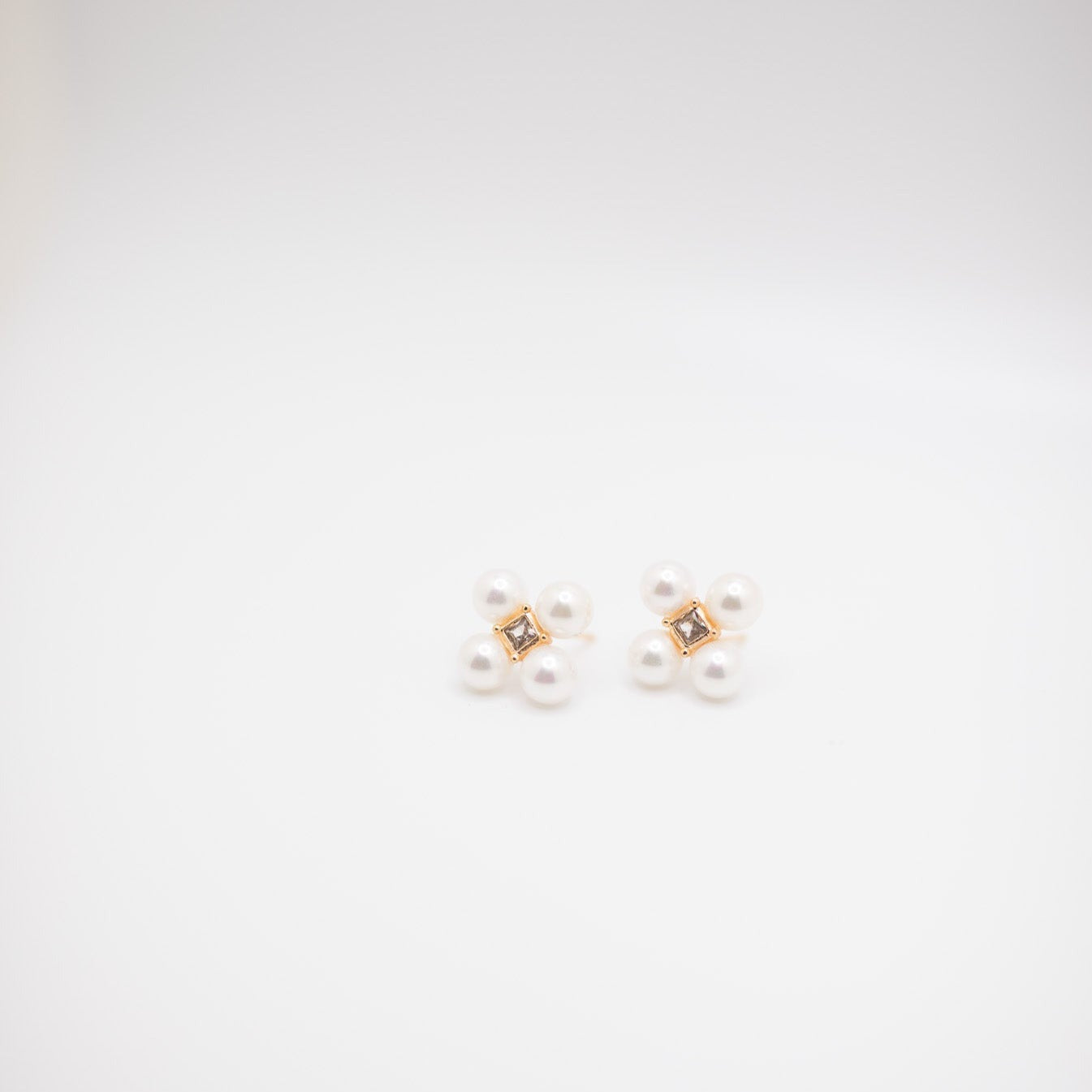 Pearl and crystal clover earrings