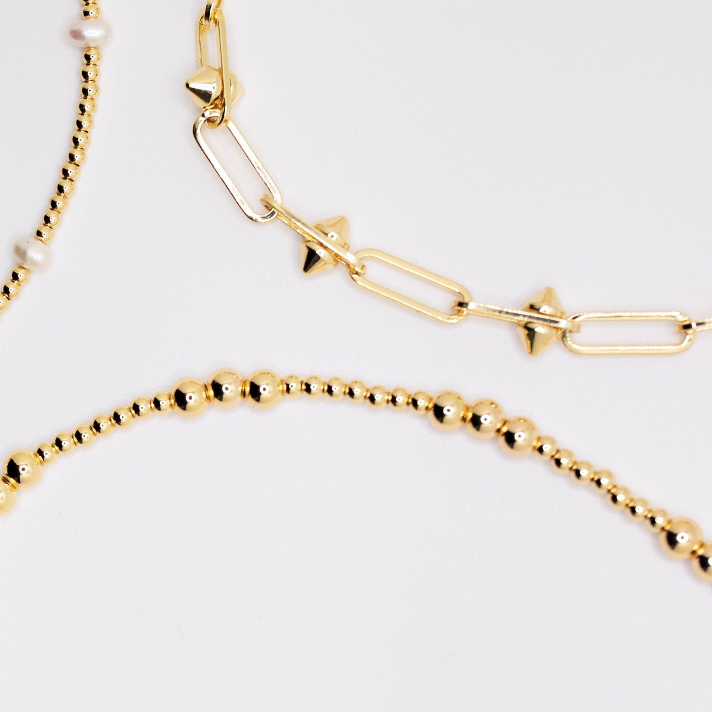 Gold stacking necklaces