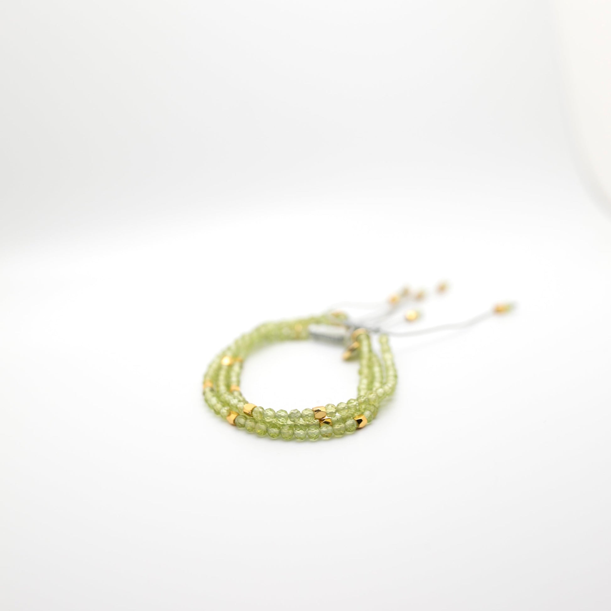 Green sparkle bead with gold beads 