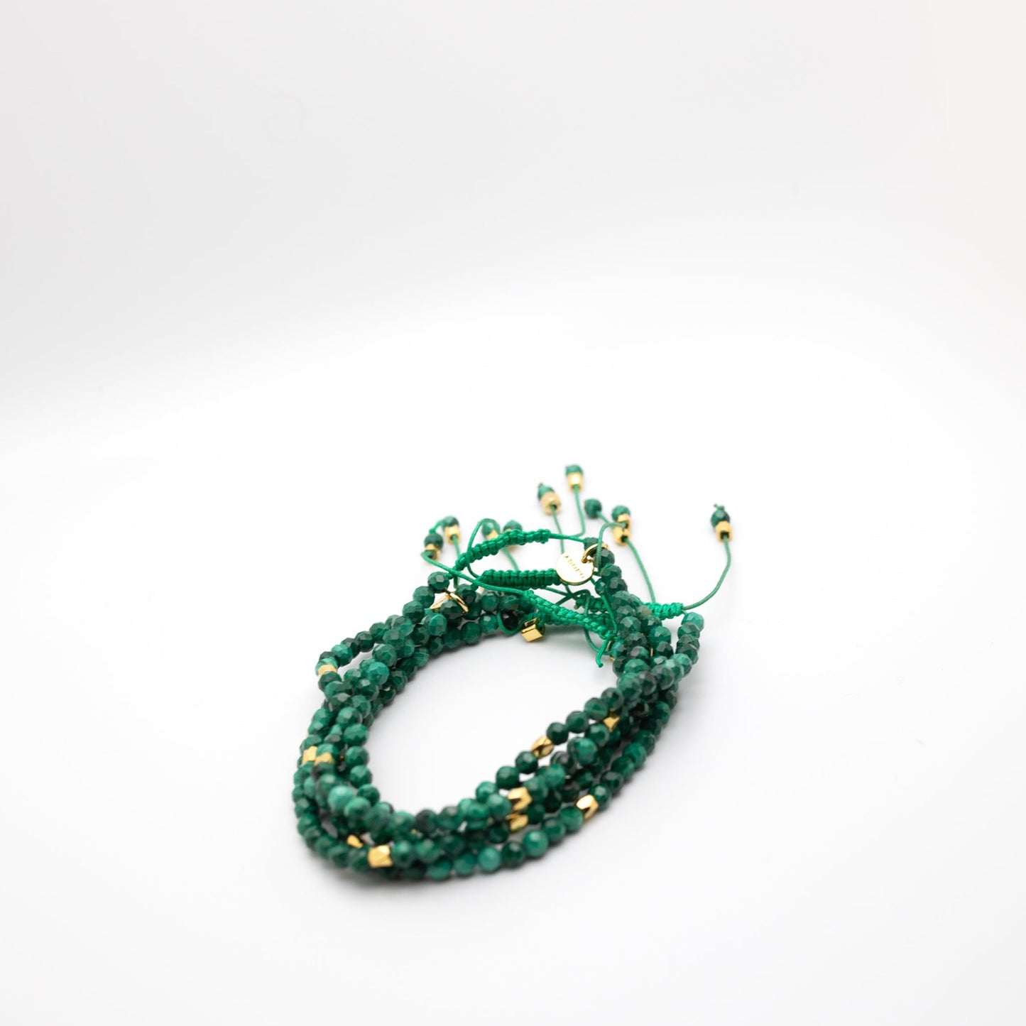 Dark green malachite bracelet with gold beads 