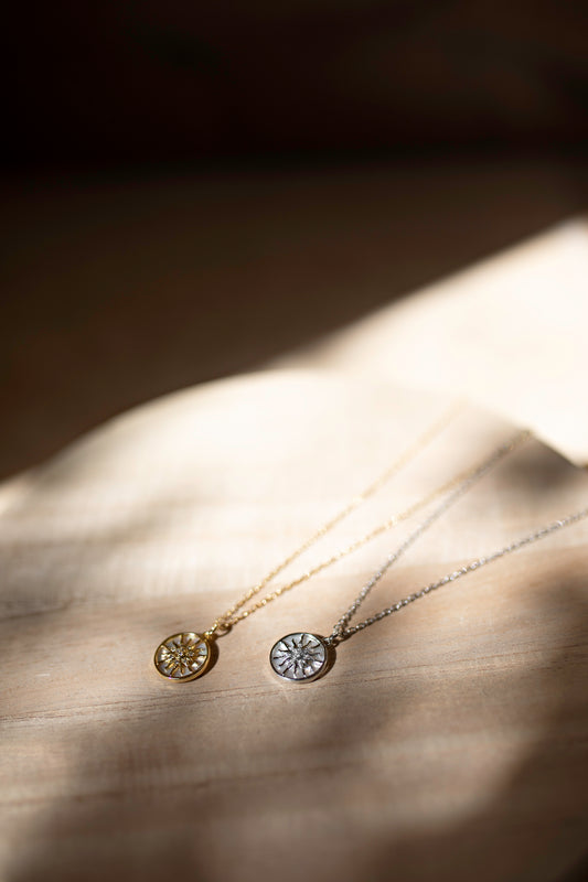 gold and silver sun necklaces