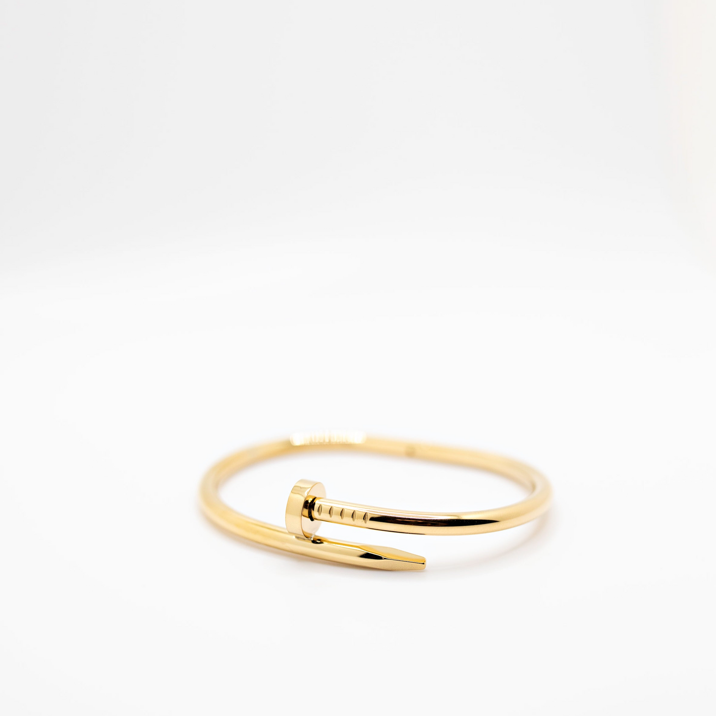 Gold nail head bangle bracelet