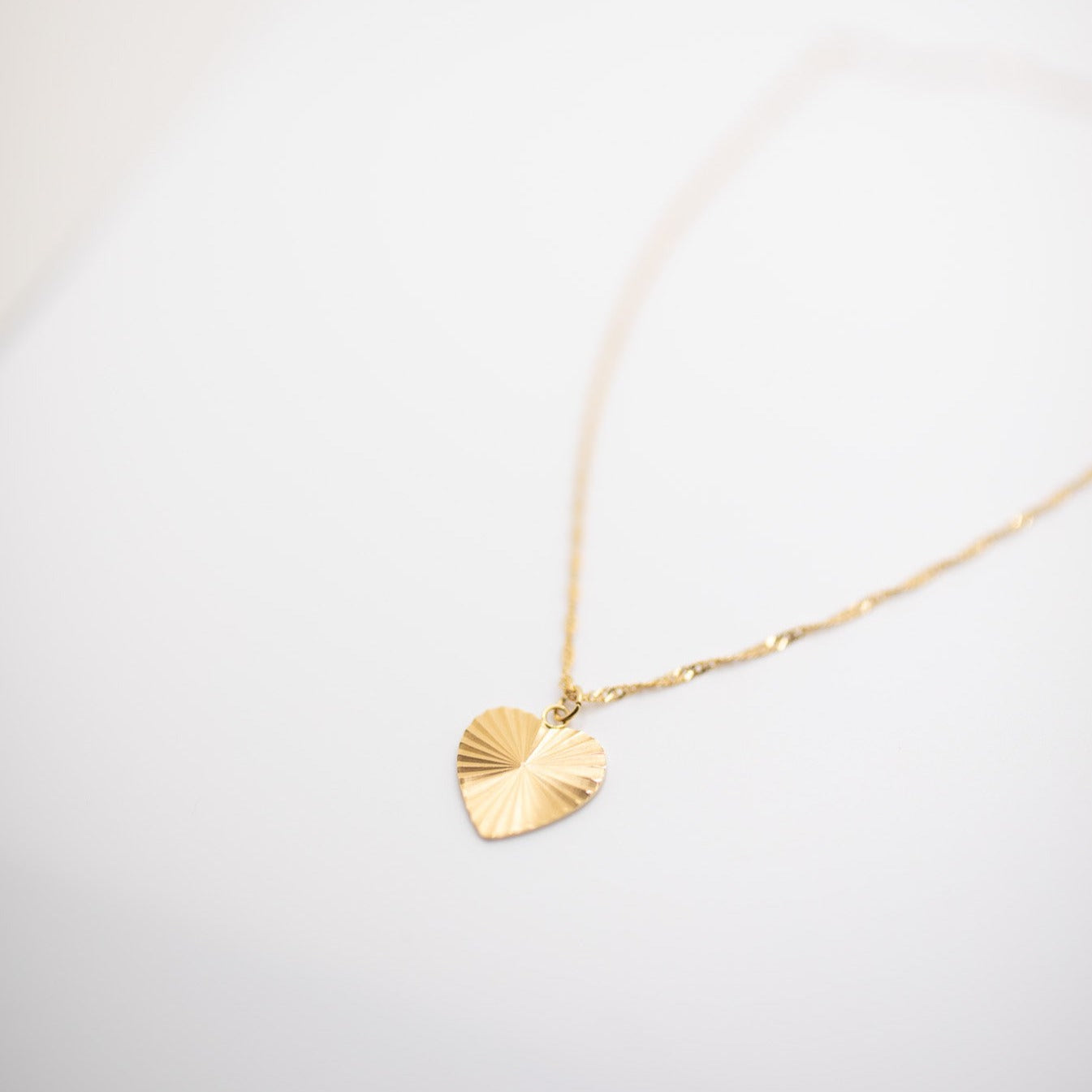 Gold art deco texture heart charm necklaces