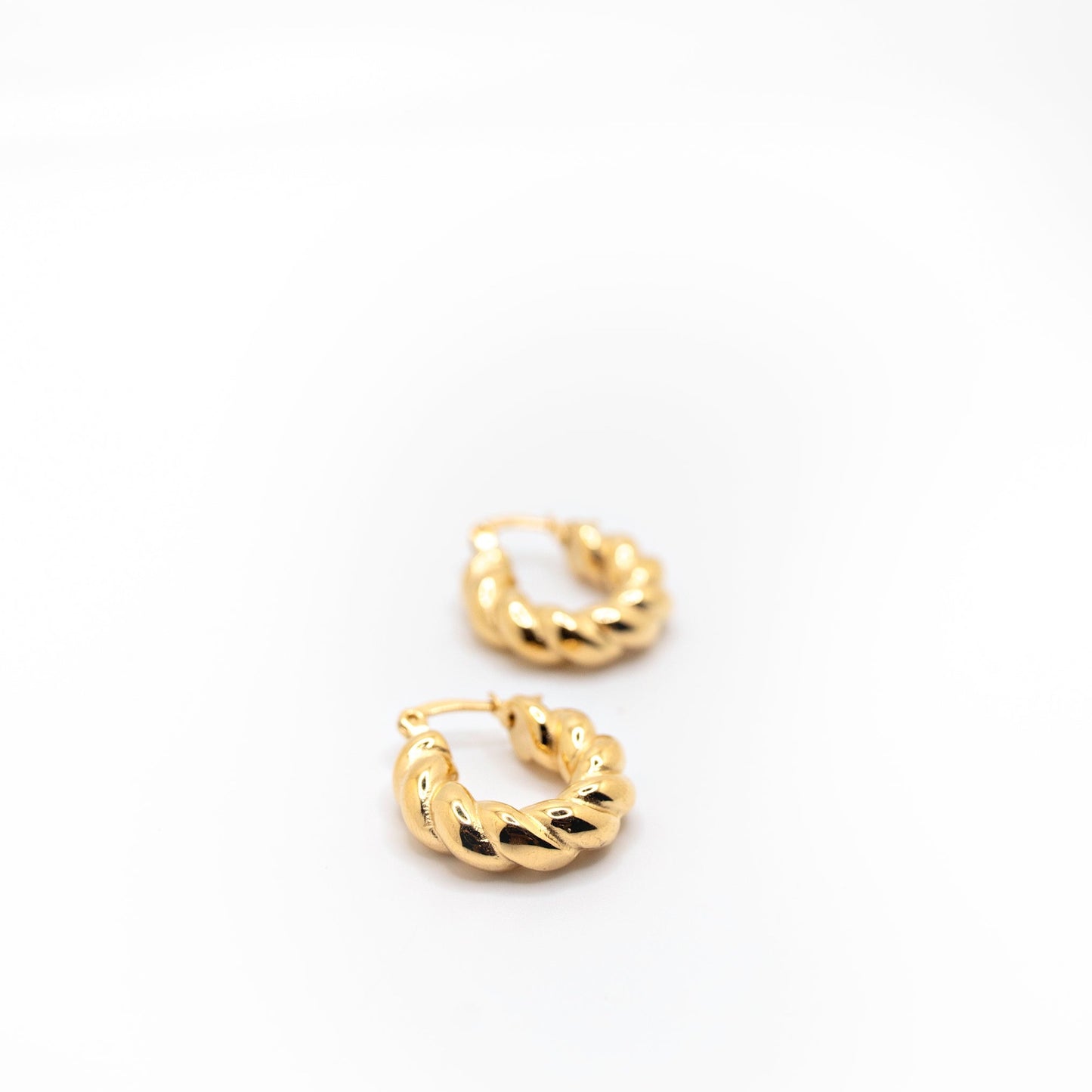 Twisted gold hoop earrings