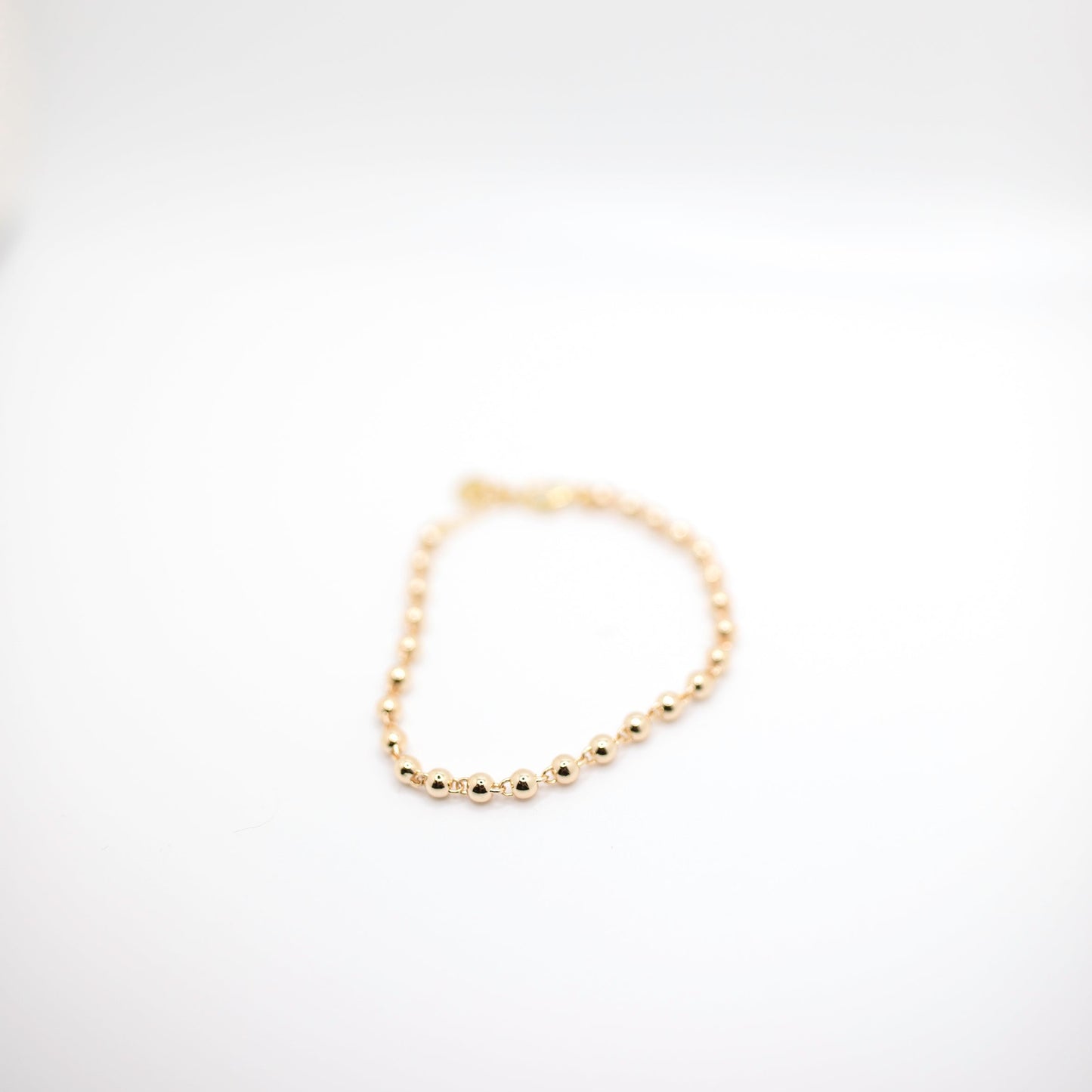 Gold ball and chain bracelet