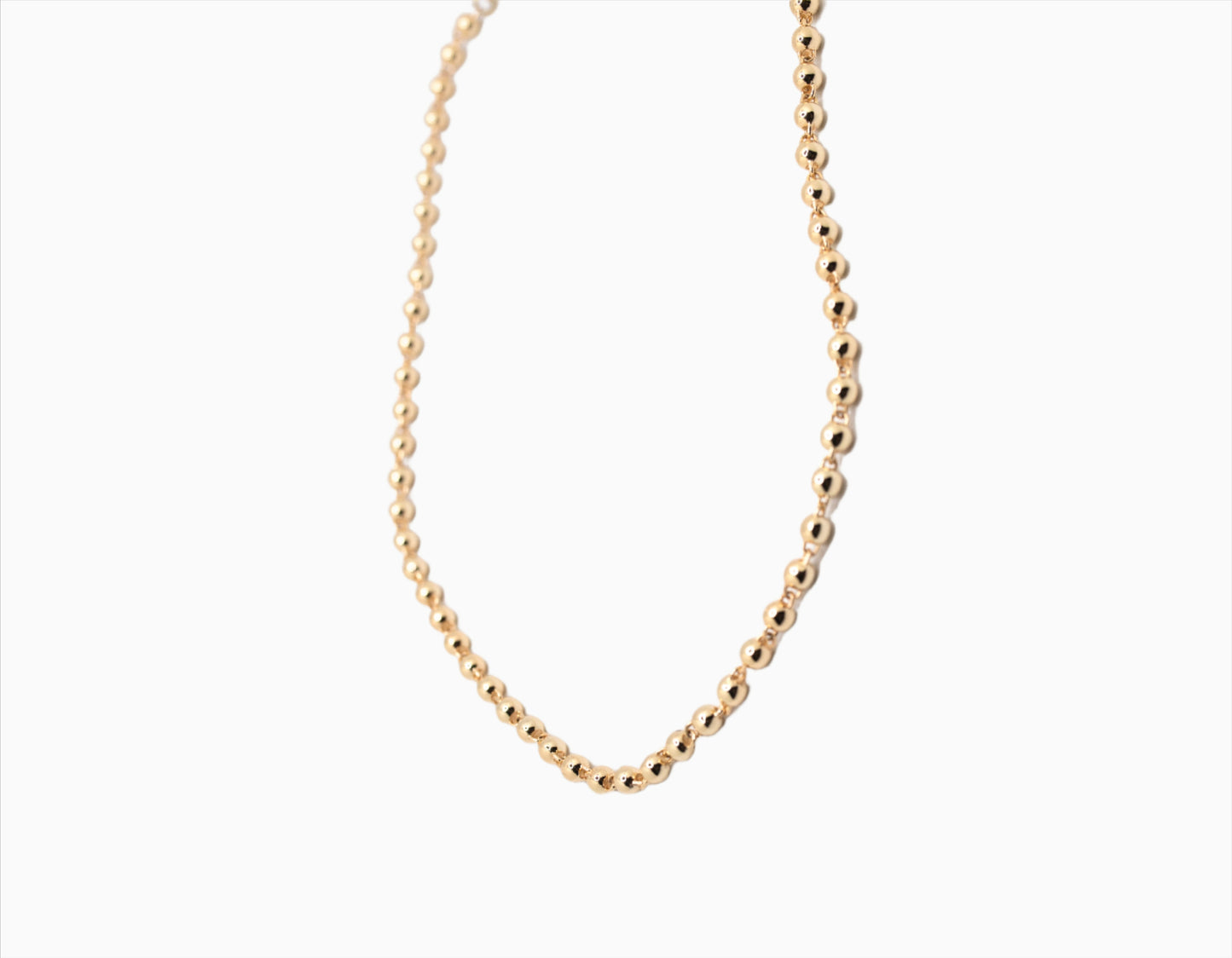 Gold ball and chain necklace called the bella necklace