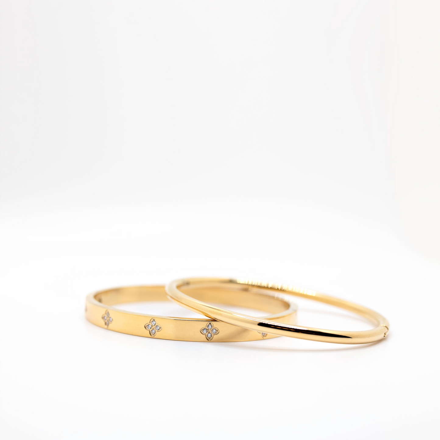 gold stacked bangle bracelets with crystals