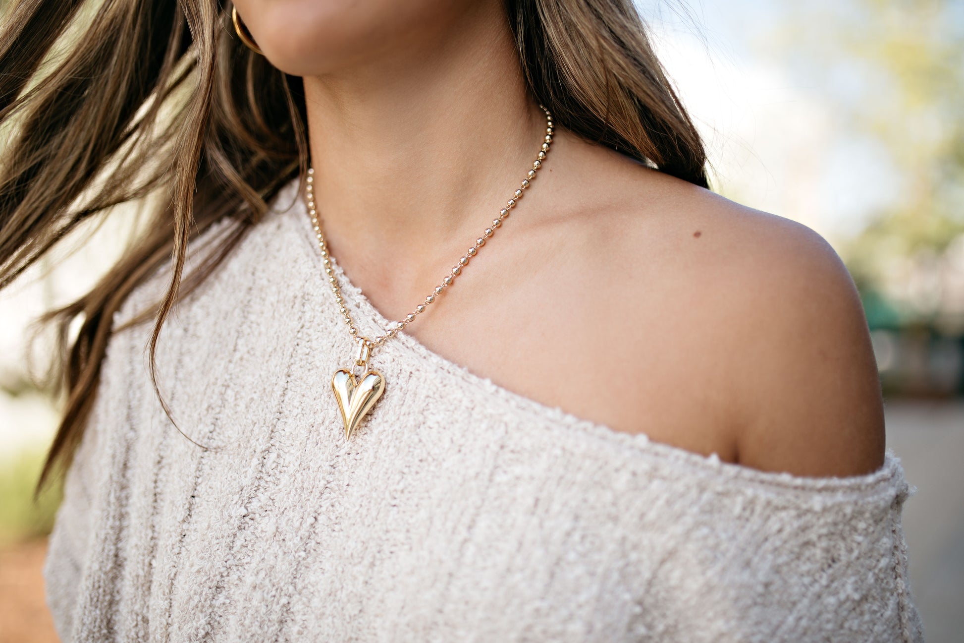 Gold bubble heart charm with chain 