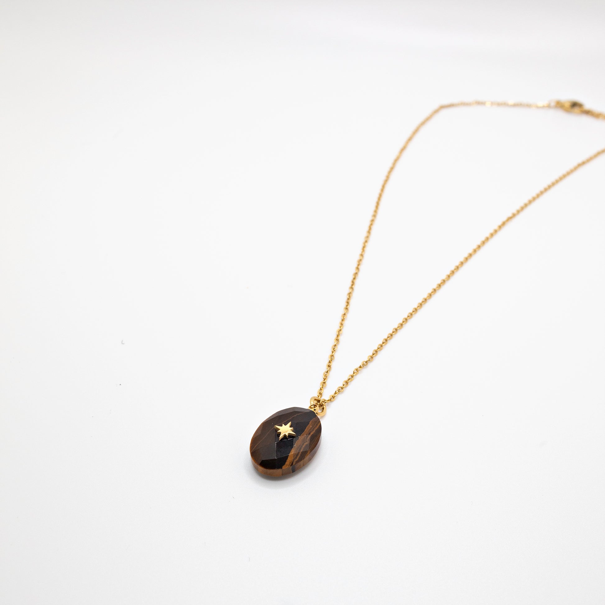 Tigers eye stone and gold necklace with star charm