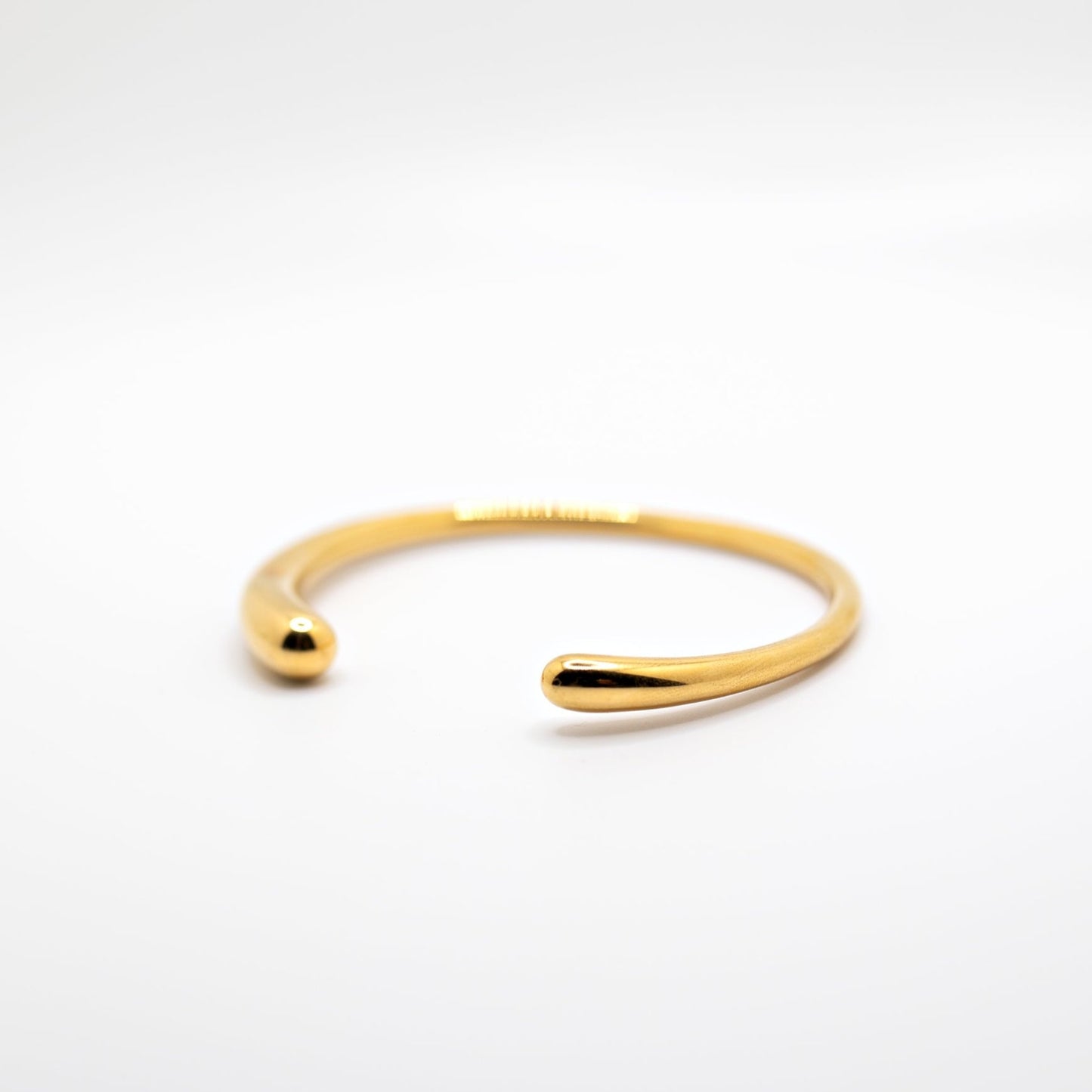 Gold open asymmetrical cuff bracelet 