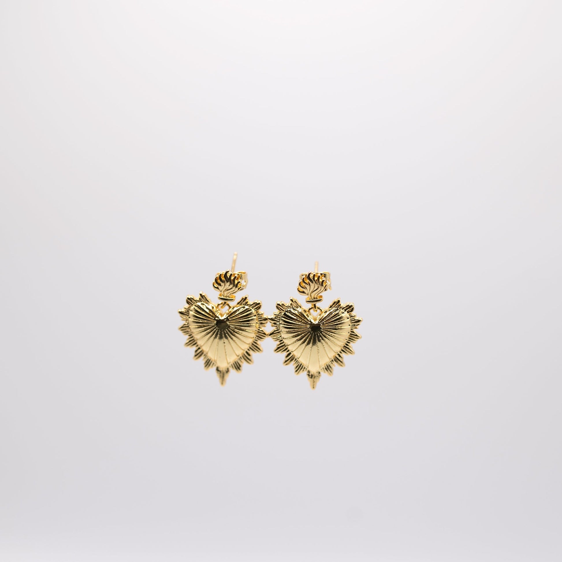 Gold sacred heart drop earrings