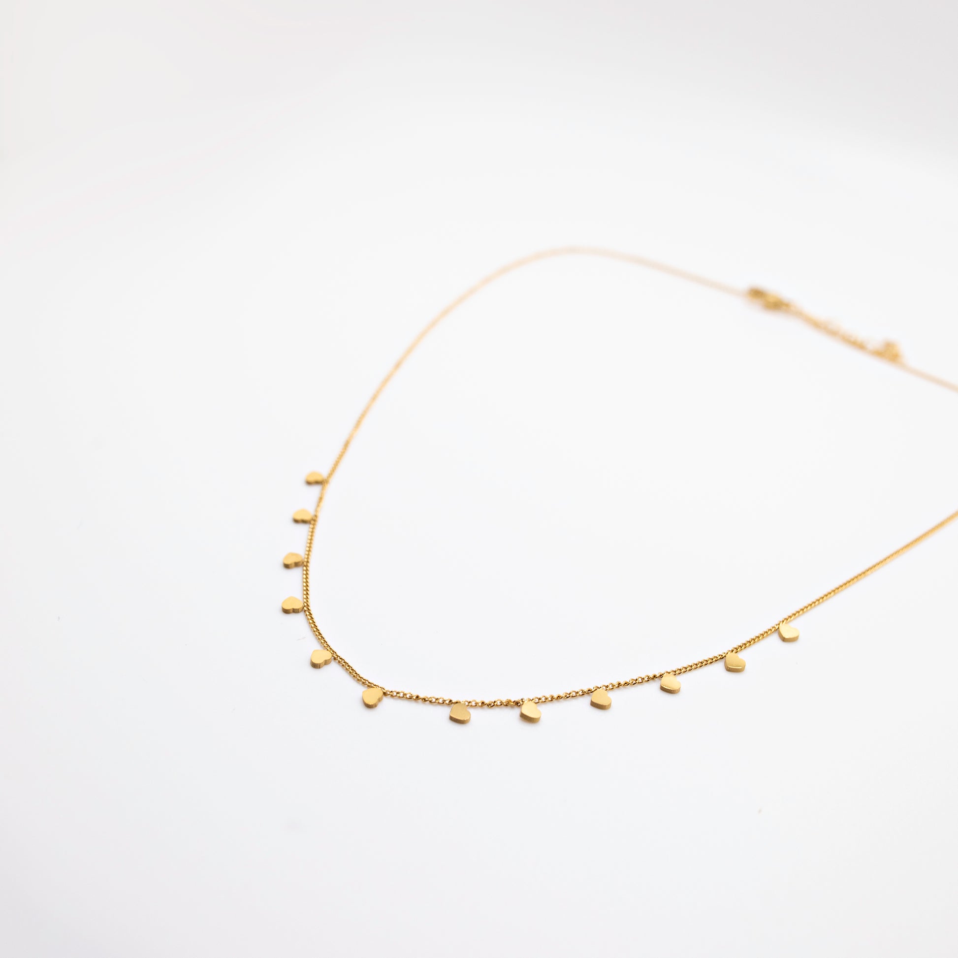 Gold micro heart necklace