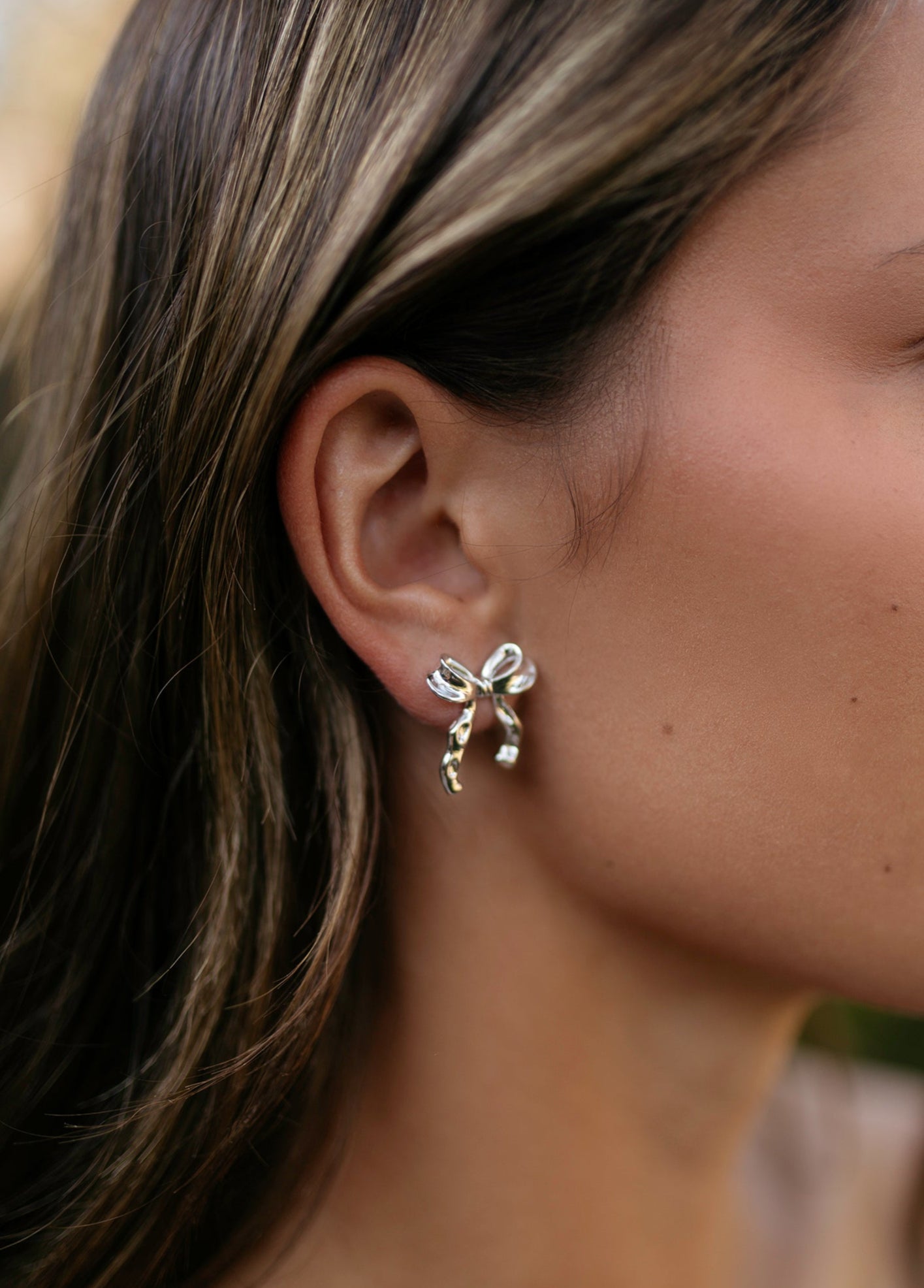 Silver bow earrings