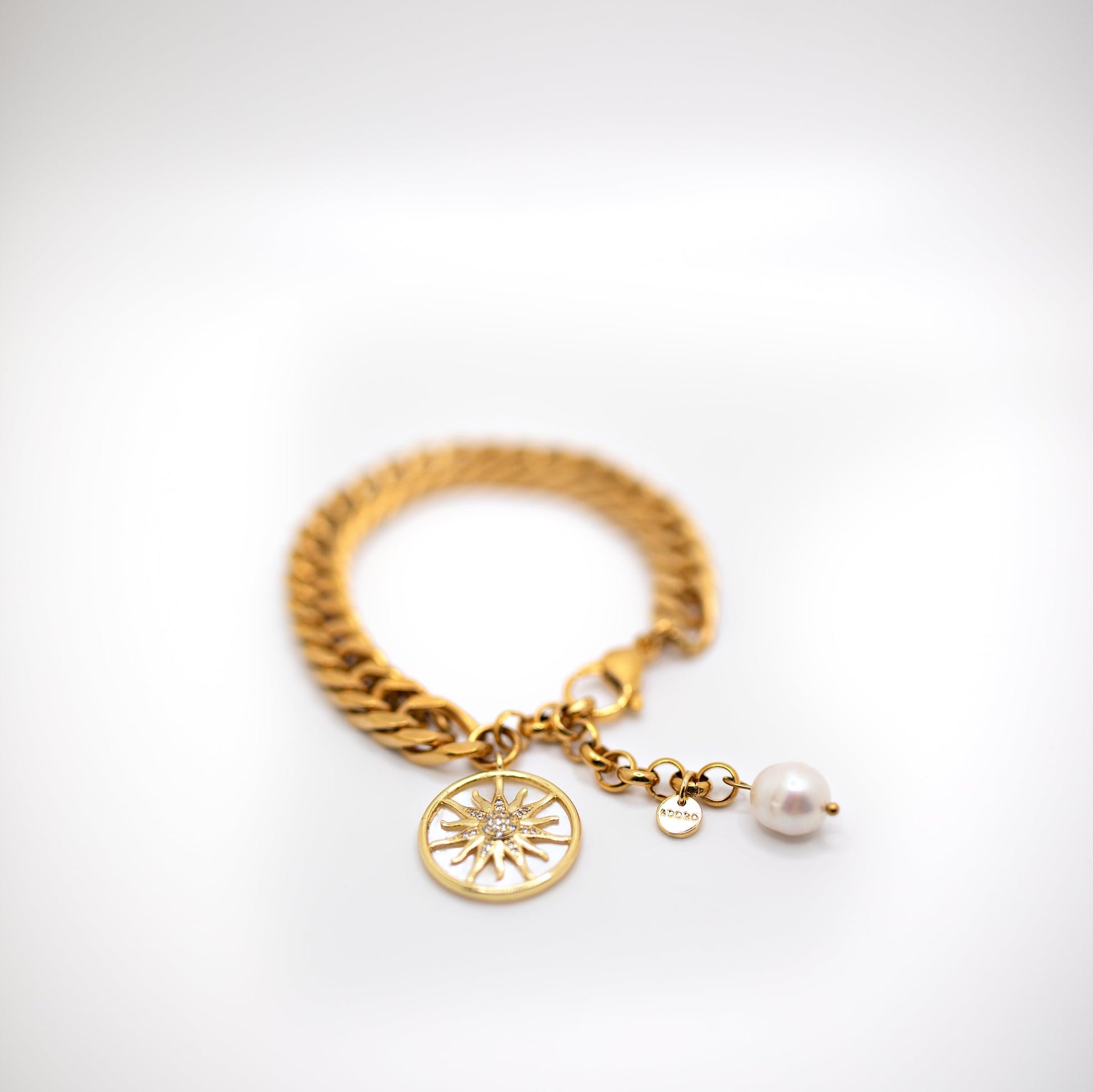 Statement gold charm chain bracelets with sun and pearls 